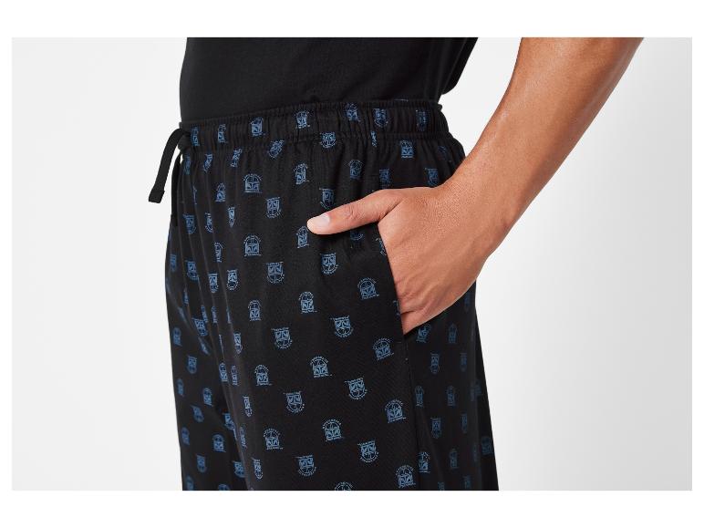 Schwarze Schlafanzughose mit Star Wars-Motiv.