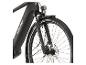 Schwarzes E-Bike mit Federgabel, Green Shield 3MM Reifen und Vorderlicht.