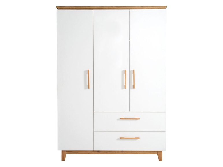 Ein weißer Kleiderschrank mit zwei Türen und zwei Schubladen.