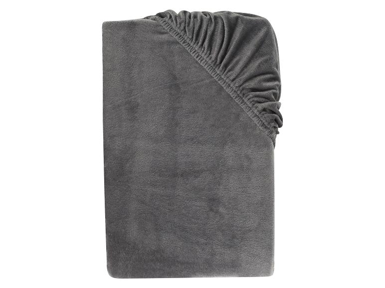 Graues Spannbettlaken, gefaltet, mit Gummizug