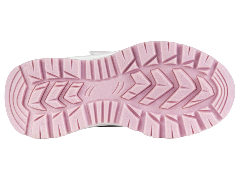 Die rosa Sohle eines weißen Sneakers.