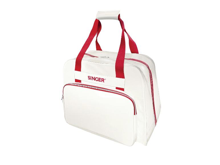 Weiße SINGER Nähmaschinen-Tragetasche mit roten Riemen und Reißverschlüssen.