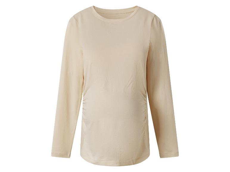 Ein beiges Langarm-Schwangerschafts-T-Shirt mit Raffungen an den Seiten.