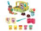 Play-Doh Garten-Set mit Korb, Werkzeugen, Blumentöpfen und bunter Knetmasse.