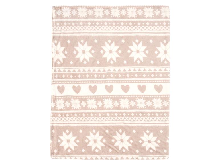 Weiche beige Decke mit Schneeflocken- und Herzmuster.