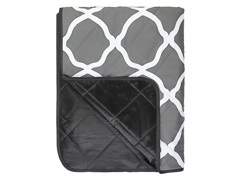 Eine graue und schwarze Decke mit einem weißen geometrischen Muster.