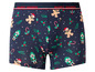 Blaue Boxershorts mit Weihnachtsmuster, Lebkuchenmann und Nussknacker.