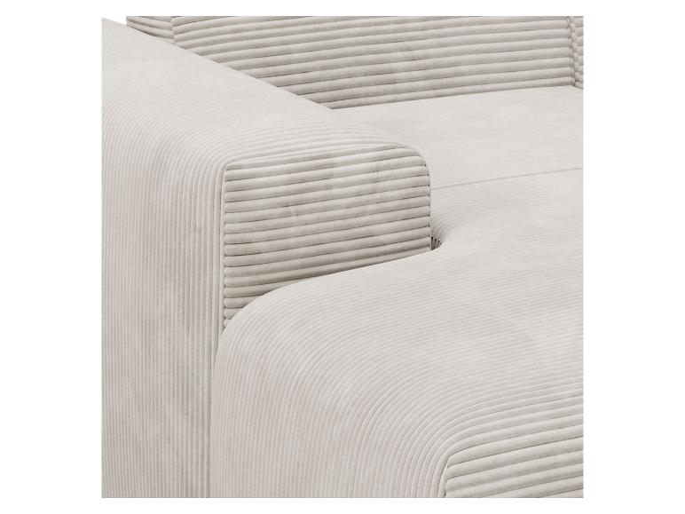 Graue Samtcouch mit ausgeprägter Textur.