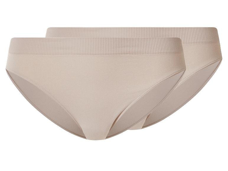 Zwei beige gerippte High-Waist-Slips.