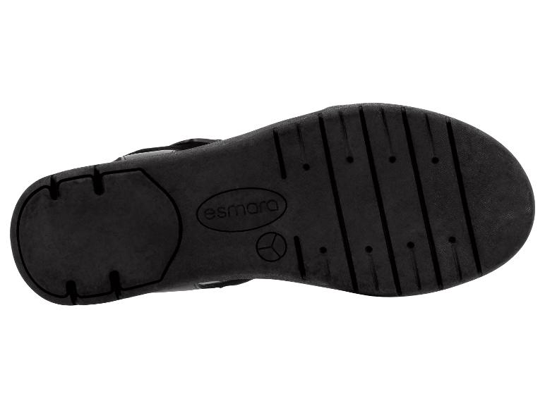 Schwarze Sandalensohle mit Profil und Markenlogo.