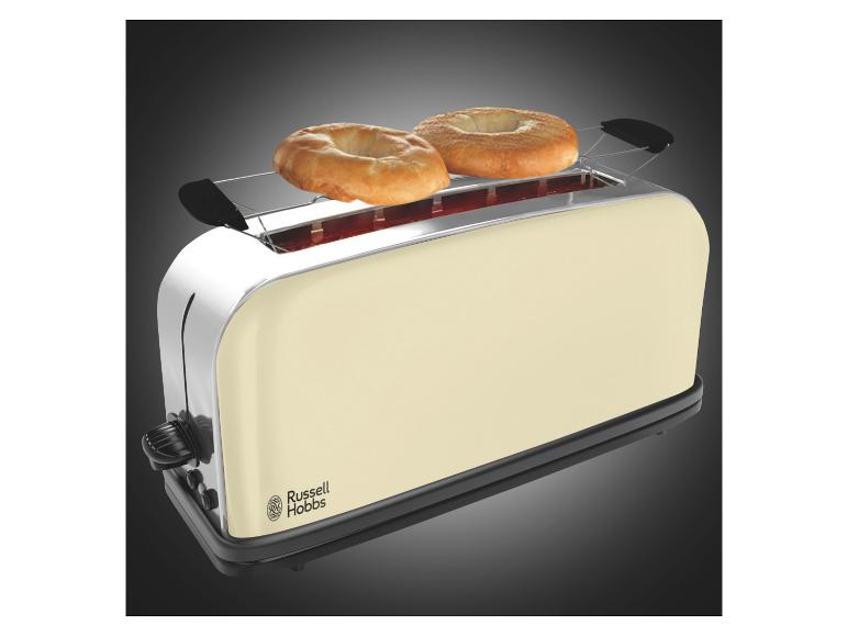 Ein cremefarbener Russell Hobbs Toaster mit zwei Bagels darin.