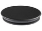 Eine schwarze runde Abdeckung für ein Loch.