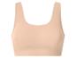 Nahtloser beiger Sport-BH für Damen.