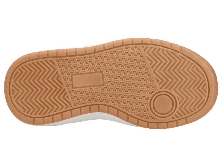 Braune Sportschuhsohle mit gemustertem Profil.