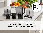 Spülmaschinengeeignetes Zubehör des SILVERCREST® Premium Slow-Juicers auf einer Arbeitsplatte.