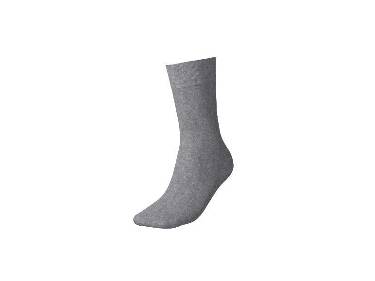 Eine einzelne graue Socke aus Baumwollstoff, von der Seite gesehen.