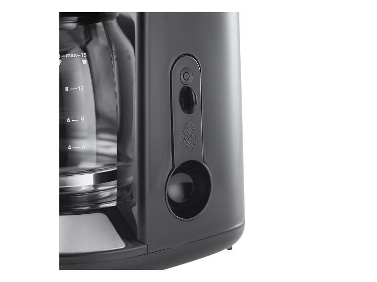 Schwarze Kaffeemaschine mit Glaskaraffe und Wasserstandsanzeige.