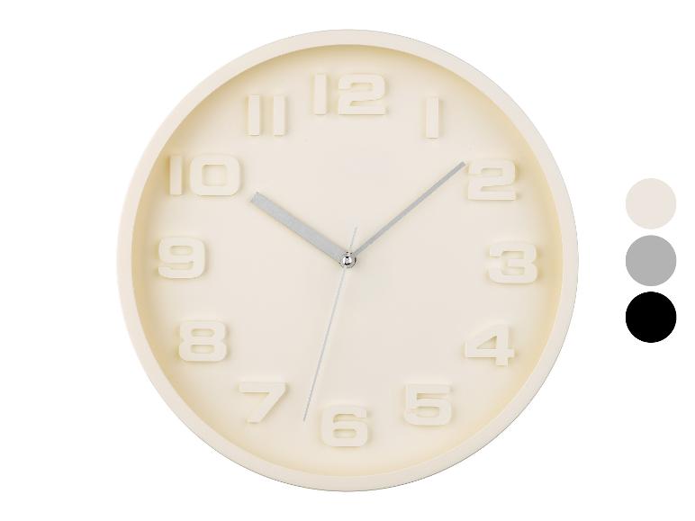 Runde Wanduhr, minimalistisches Design, cremefarben.