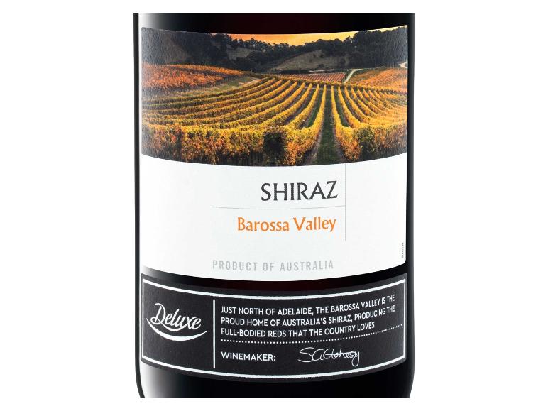 Eine Flasche Deluxe Shiraz Barossa Valley Wein mit einer Weinberglandschaft auf dem Etikett.