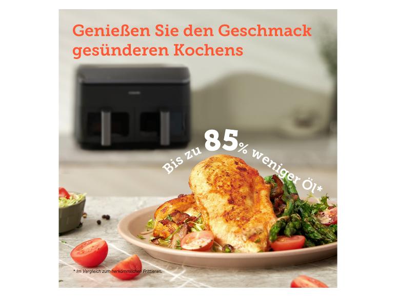 Gebratenes Hähnchen und Gemüse mit einer Heißluftfritteuse, „Bis zu 85 % weniger Öl“.