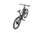 Graues vollgefedertes E-Mountainbike mit sichtbarem Display.