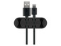 Schwarze Kabelclips zum Organisieren von USB- und USB-C-Kabeln.