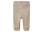Beige Babyhose mit hohem Bund und elastischen Bündchen.