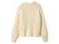 Cremefarbener Strickpullover mit Raglanärmeln.