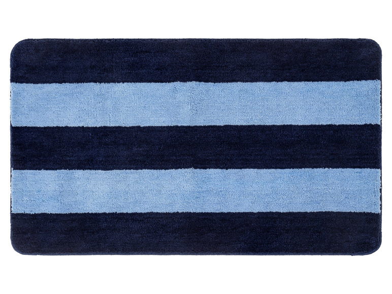 Eine blaue und dunkelblaue Badematte mit Streifen.