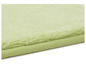 Eine hellgrüne Badematte mit Plüschtextur.