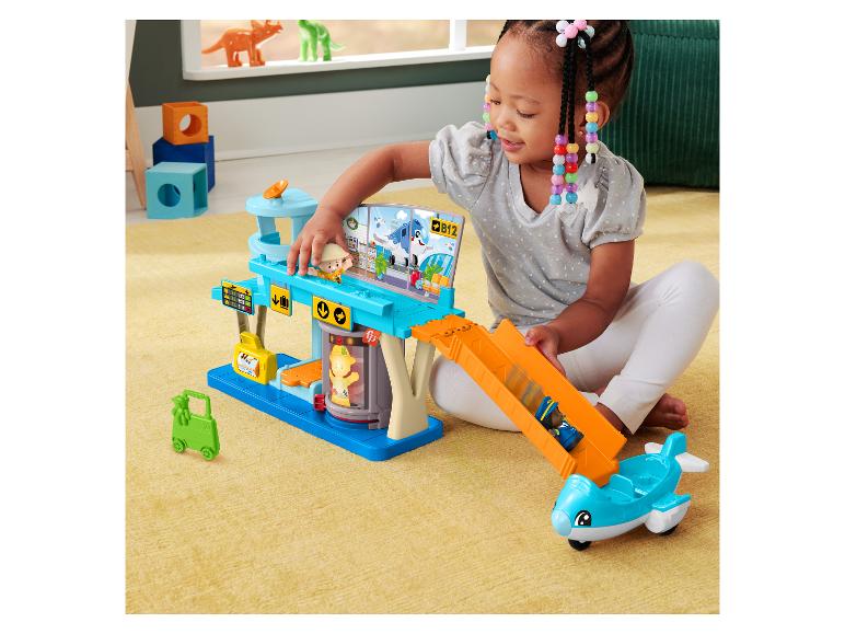 Flughafen-Spielset mit Flugzeug, ein Kind spielt mit Figuren und einer Rutsche.