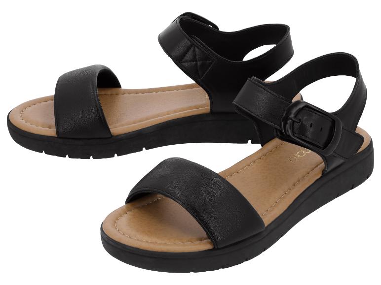 Schwarze Damensandalen mit dicker Sohle und Schnallenverschluss.
