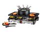 Raclette- und Fondue-Set mit Grillplatte, kleinen Pfännchen und Fondue-Topf.