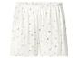 Weiße gerippte Shorts mit zartem rosa Blumenmuster und Rüschensaum.