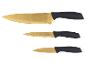 Ein Set mit drei goldenen Messern mit schwarzen Griffen von Russell Hobbs.