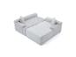 Hellgraues modulares Cordsofa mit Kissen, auf weißem Hintergrund.