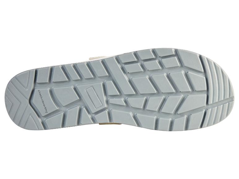 Die Sohle eines Schuhs mit einem Profil für Grip und Dämpfung.