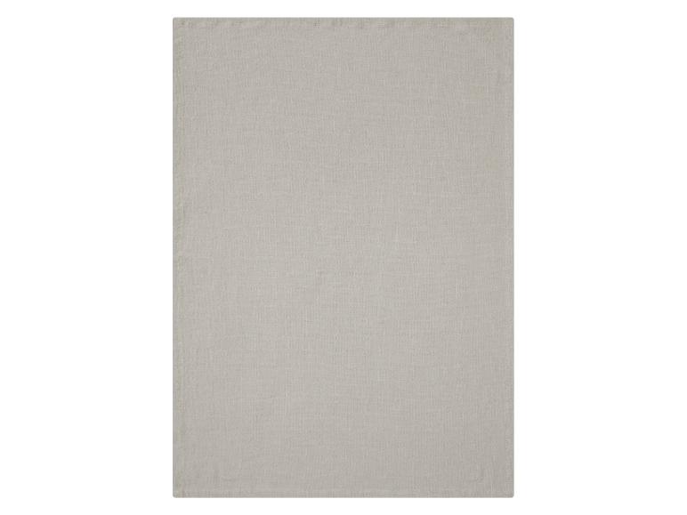 Hellbeige Haushaltswäsche: Tischdecke oder Serviette aus Leinen.