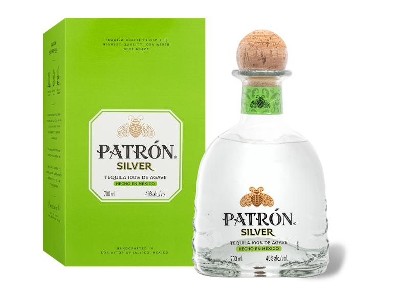 Silber-Tequila in einer klaren Glasflasche mit Korkverschluss und grüner Verpackung.