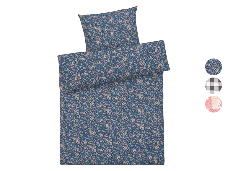 Ein blaues Bettbezugset mit Blumenmuster