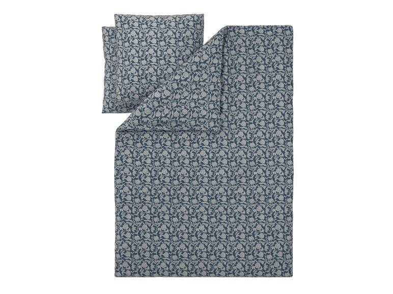 Bettbezug- und Kissen-Set mit blau-grauem Blumenmuster.