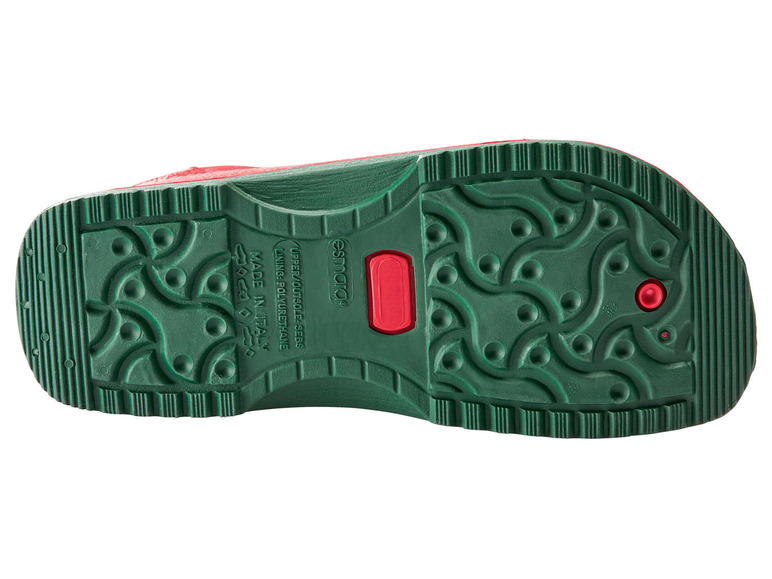 Grüne Sohle von roten Esmara Gummistiefeln.