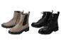 Zwei Paar Damen-Stiefeletten: beige Chelsea Boots und schwarze Schnürstiefel.
