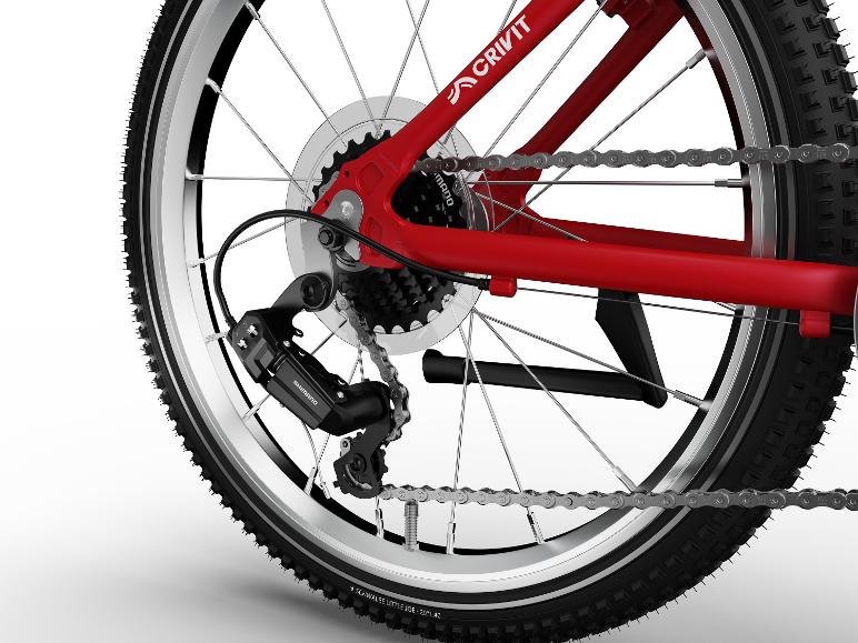 Nahaufnahme des Hinterrads eines roten Fahrrads, zeigt Schaltwerk, Kassette und Kette.