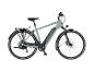 Mintgrünes E-Trekkingrad mit integriertem Akku und Gepäckträger.