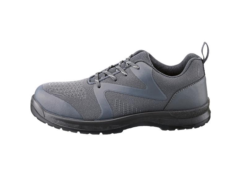 Grauer Sportschuh mit schwarzen Details und Schnürsenkeln.