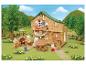 SYLVANIAN FAMILIES Haus am See mit Möbeln und Tieren, die Marshmallows rösten.