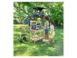 LUPILU® Holz-Outdoorküche mit spielenden Kindern im Garten