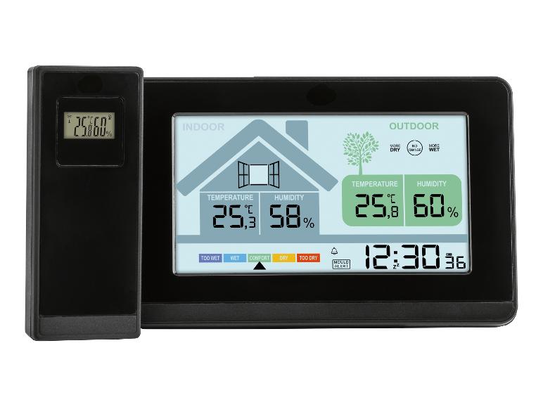Digitales Thermometer und Hygrometer, das Innen- und Außentemperatur sowie Luftfeuchtigkeit anzeigt.