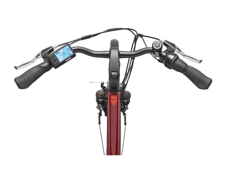 Draufsicht auf den Lenker eines E-Bikes mit Digitalanzeige, Bremshebeln und Gangschaltung.